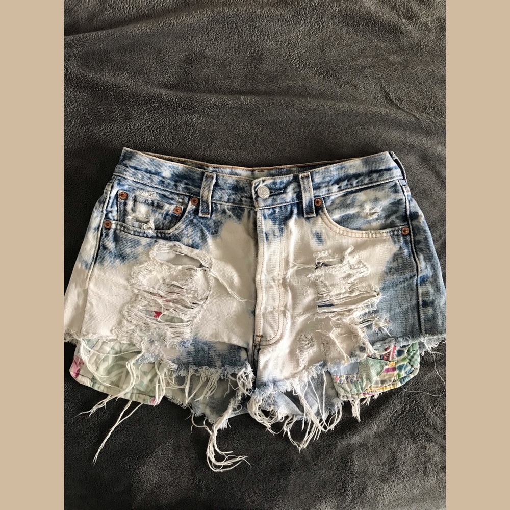 Distressed bleached denim shorts
